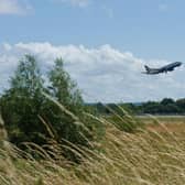 Flight taking off at Gatwick Airport.