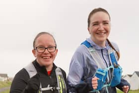 Heather (left) is running her first ever marathon with West Sussex Mind's Nina as her support runner. Picture by Kristian Coburn