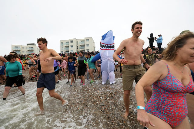 Some 385 people braved the ice cold sea water on New Year's Day 2024