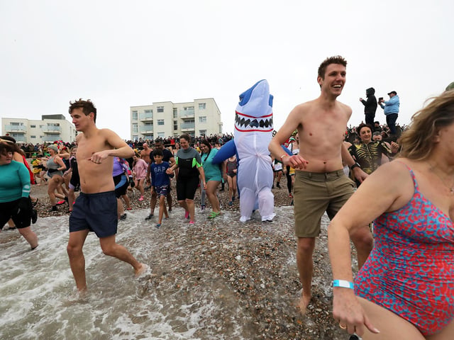 Some 385 people braved the ice cold sea water on New Year's Day 2024