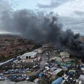 Black smoke billows from major fire at Lancing Business Park. Photo: Eddie Mitchell