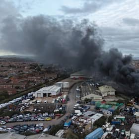 Black smoke billows from major fire at Lancing Business Park. Photo: Eddie Mitchell