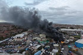 Black smoke billows from major fire at Lancing Business Park. Photo: Eddie Mitchell