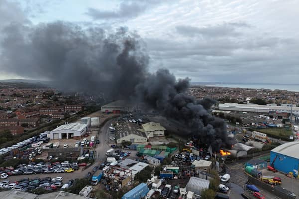 Black smoke billows from major fire at Lancing Business Park. Photo: Eddie Mitchell