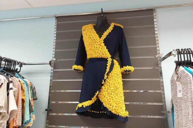 Marie Curie charity shop in Montague Street has been decorated in the beautiful bright yellow flowers with the incredible designs – inside and outside the shop – created by volunteer Jackie Varty.
