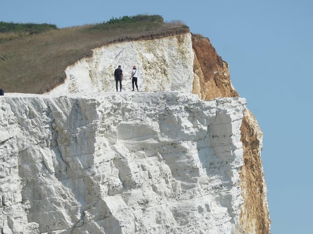Visitors on Seaford Head on July 30, following several cliff falls over the past year