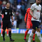 English referee Stuart Attwell during the Premier League match between Tottenham Hotspur and Brighton and Hove Albion  (Photo by BEN STANSALL/AFP via Getty Images)