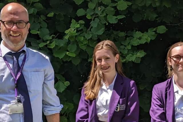 Lauren Clark (Year 10) on the left and Daisy Corless (Year 9) on the right, and Steve Thurley (Head of Arts Faculty) and Alex Reed (NYT Co-Ordinators)