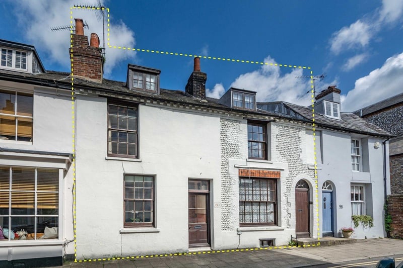 This four-bedroom town house in the heart of Arundel was once two separate properties. It is on the market with Pegasus Properties at a guide price of £895,000.