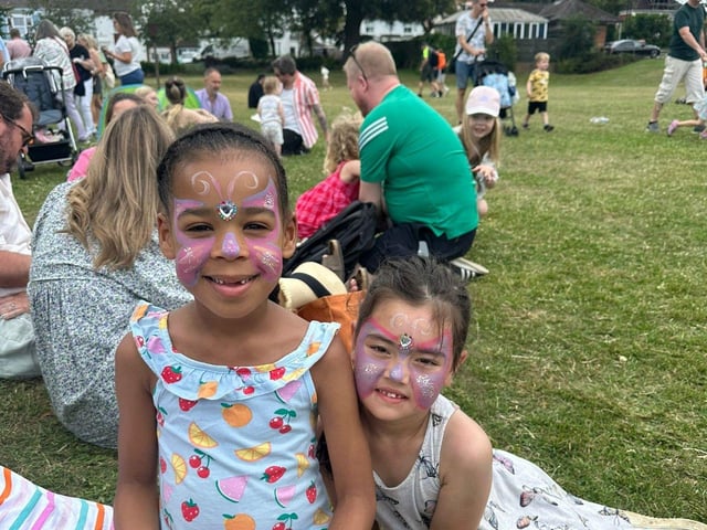 Kids enjoying the free face painting
