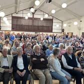More than 400 people attended a protest meeting over plans for 265 new homes in Steyning - but a large number had to be turned away for safety reasons