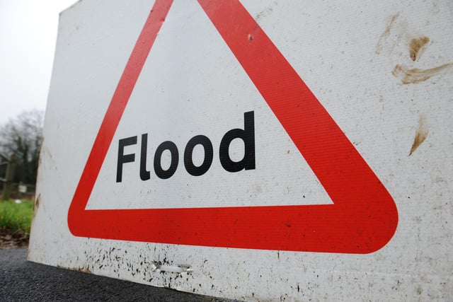 JPCT 221212 Wet weather. Flood sign, Thakeham. Photo by Derek Martin