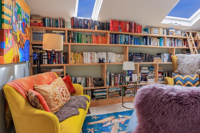 "A home with its very own library, a stunning room serving as both study and reading room. Naturally zoned with fitted shelving reaching up to the sloping ceiling, light pours in through three large skylights."