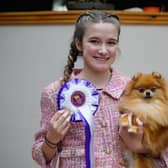 A Horsham 15-year-old is competing in the world’s greatest dog show this weekend with her beloved Sheepdog and Pomeranian.
