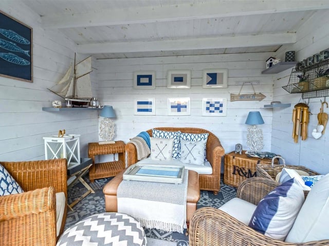 The Marine Crescent home also features a fantastic outdoor space, complete with the bright, welcoming summer house