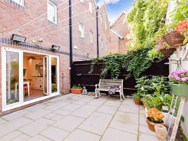 The courtyard style garden offers plenty of privacy.,