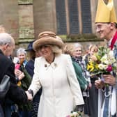 The crowds welcome Queen Camilla outside Worcester Cathedral.