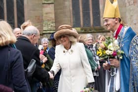 The crowds welcome Queen Camilla outside Worcester Cathedral.