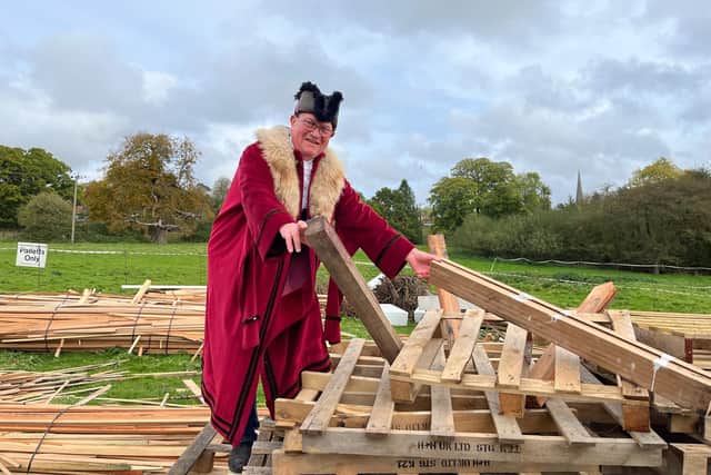 The new Mayor of Cuckfield Jem Lee makes a start on building this year's bonfire