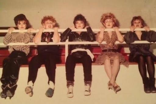 On the balcony of College gym. I’m second from the right.