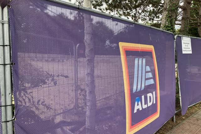The site of the new Aldi store in Horsham is surrounded by fencing and screening. Photo: Sarah Page