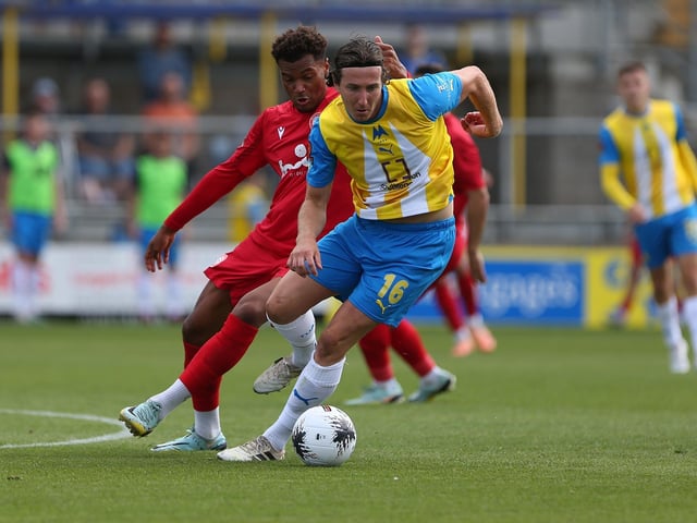 Action from Worthing's 3-0 win at Torquay United which put them top of National League South