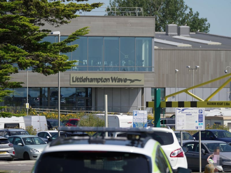 Multiple caravans have parked outside Littlehampton Wave in Sea Road and the police have been called.