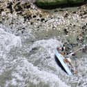 Photos show a grounded yacht in the water at Seaford Head on Friday, April 19