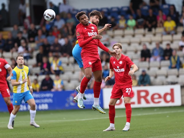 Action from Worthing's 3-0 win at Torquay United which put them top of National League South