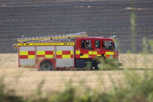 Firefighters successfully extinguished a fire in a field at Upwaltham, close to the A285. Photo: Jack Chiverton