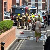 A photo taken outside the Guildbourne Centre, off Ann Street in Worthing, showed multiple firefighters at the scene. Photo: @brightonsnapper / Twitter
