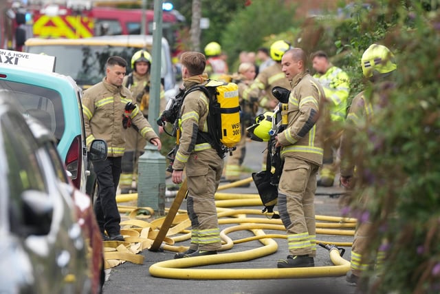 In photos: emergency services attend fire at Hove property as residents ...