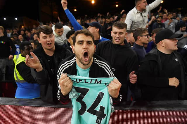 LONDON, ENGLAND - SEPTEMBER 27:A Brighton fan holds the shirt of Joel Veltman of Brighton & Hove Albion after the Premier League match between Crystal Palace and Brighton & Hove Albion at Selhurst Park on September 27, 2021 in London, England. (Photo by Mike Hewitt/Getty Images)