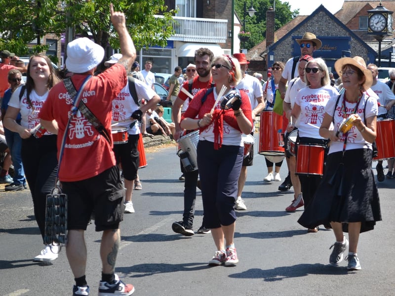 The floats and walking groups proceeded through the village in colourful and imaginative costumes with crowds of spectators lining the streets to cheer them on