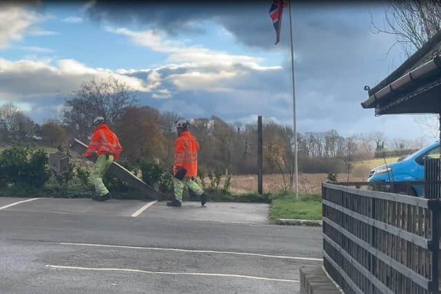 National Highways staff remove the bird box and fake camera. Picture: Winchelsea Lodge