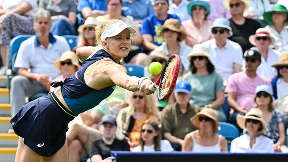 Britain's Harriet Dart returns to China's Zhang Shuai during their women's singles round of 32 tennis match