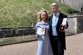 Dame Jayne Torvill and Sir Christopher Dean receiving their honours at Windsor castle in June. Dean was wearing a Dobell suit. Photo: contributed