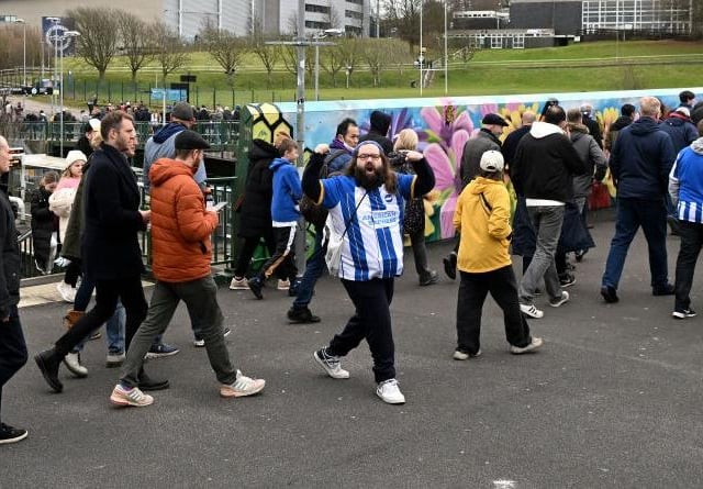 BRIGHTON, ENGLAND - FEBRUARY 04: Fans arrive at the stadium prior to the Premier League match between Brighton & Hove Albion and AFC Bournemouth at American Express Community Stadium on February 04, 2023 in Brighton, England. (Photo by Mike Hewitt/Getty Images)