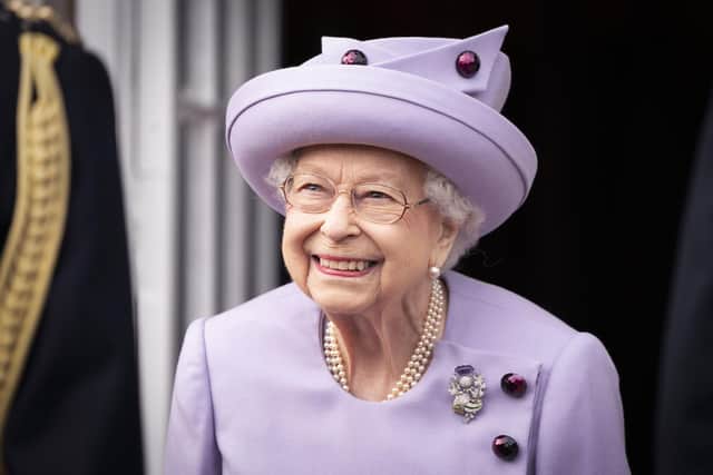 EDINBURGH, SCOTLAND - JUNE 28: Queen Elizabeth II attends an Armed Forces Act of Loyalty Parade at the Palace of Holyroodhouse on June 28, 2022 in Edinburgh, United Kingdom. Members of the Royal Family are spending a Royal Week in Scotland, carrying out a number of engagements between Monday June 27 and Friday July 01, 2022. (Photo by Jane Barlow - WPA Pool/Getty Images)