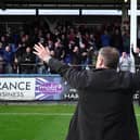 Scott Lindsey celebrates in front of Reds fans at Hartlepool at the end of last season - a win they all-but-secured safety. Picture: CTFC