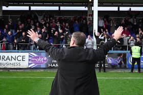 Scott Lindsey celebrates in front of Reds fans at Hartlepool at the end of last season - a win they all-but-secured safety. Picture: CTFC