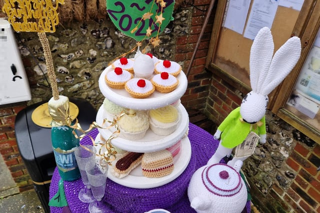 A stunning afternoon tea made from crochet has been formed into a post box topper to celebrate the 50th anniversary of Findon Village WI
