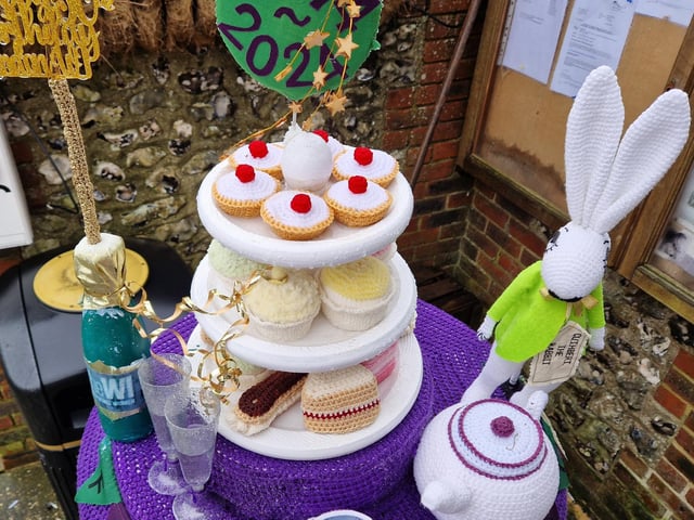 A stunning afternoon tea made from crochet has been formed into a post box topper to celebrate the 50th anniversary of Findon Village WI