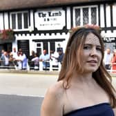 Daniella Watson at her partner Sean Foley's funeral day outside The Lamb Pub where many people were gathered to pay their respects (Photo by Jon Rigby)