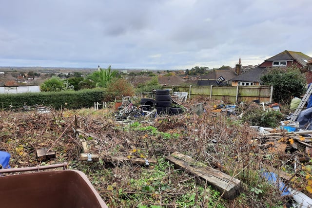 An Eastbourne home owner has been ordered to pay thousands of pounds after turning their garden into a ‘dumping ground’.