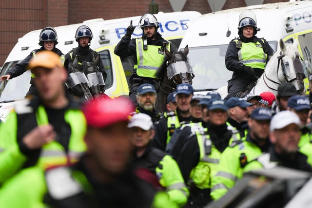 Photos taken outside Brighton railway station – and in neighbouring roads – show a large number of police officers, dealing with rowdy fans before kick-off