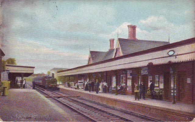 Hailsham Railway Station was on the Cuckoo Line between Polegate and Hellingly serving the town of Hailsham. Originally built in 1849 by the London, Brighton and South Coast Railway it was a terminus station serving both passengers and livestock for the nearby market. It closed to passengers in 1968. The station site was mostly cleared for a housing estate in the 1980s and all that remains now is a concrete wall on the west side of the site that held the embankment up