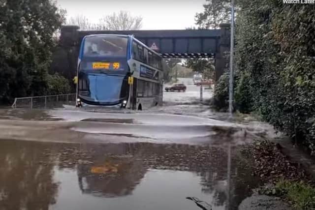 The bus driving through the flooded road. Picture: urban rot/YouTube