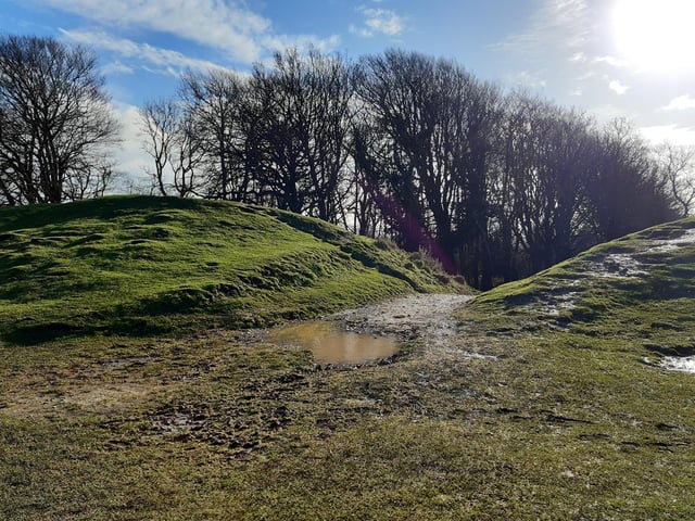 You will eventually come to another footpath through the ramparts. This would eventually take you to Broadwater, were you to follow it, but we are going to ignore it and continue round.