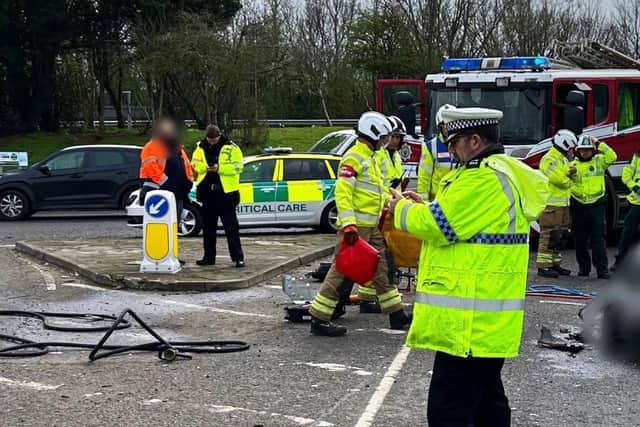 Emergency services at the scene of the collision. Picture from Sussex Police